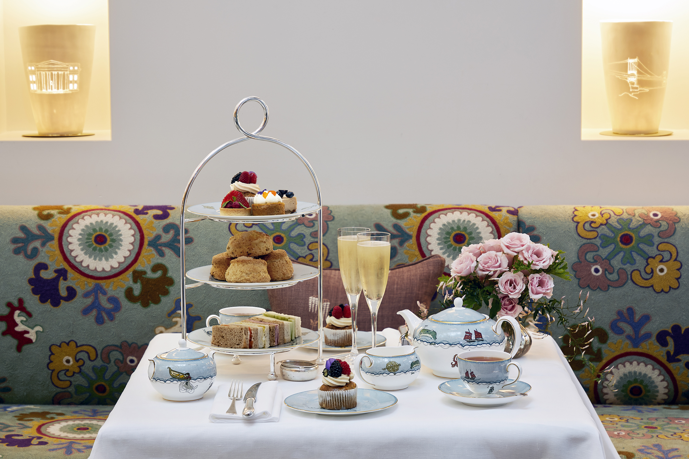 Champagne Afternoon Tea for two, served in The Whitby Restaurant, with sweet and savory treats such as finger sandwiches, scones and cakes, as well as tea served in Kit Kemp's bone china range Mythical Creatures from Wedgwood.